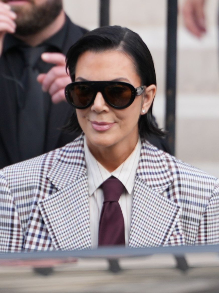 Image may contain Kris Jenner Kim Kardashian Accessories Sunglasses Formal Wear Tie Clothing Suit Adult and Person